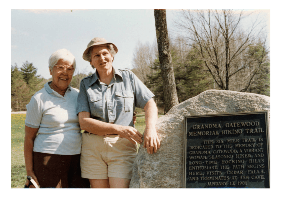 Emily Gregor and Ann Quadrano, members of the Buckeye Trail Association, shown standing at the memorial marking the entrance to the Grandma Gatewood Memorial Hiking Trail