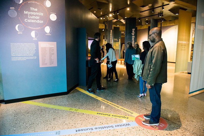Visitors exploring Indigenous Wonders of Our World at the Ohio History Center.