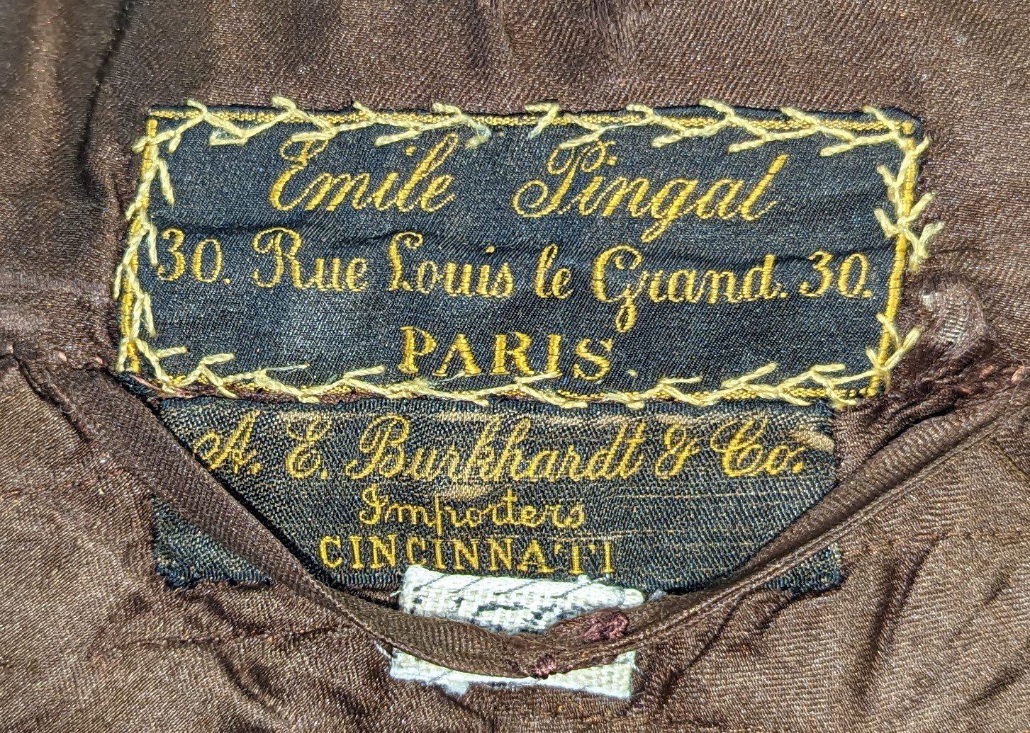 Emile Pingat designer label and Burkhardt store label