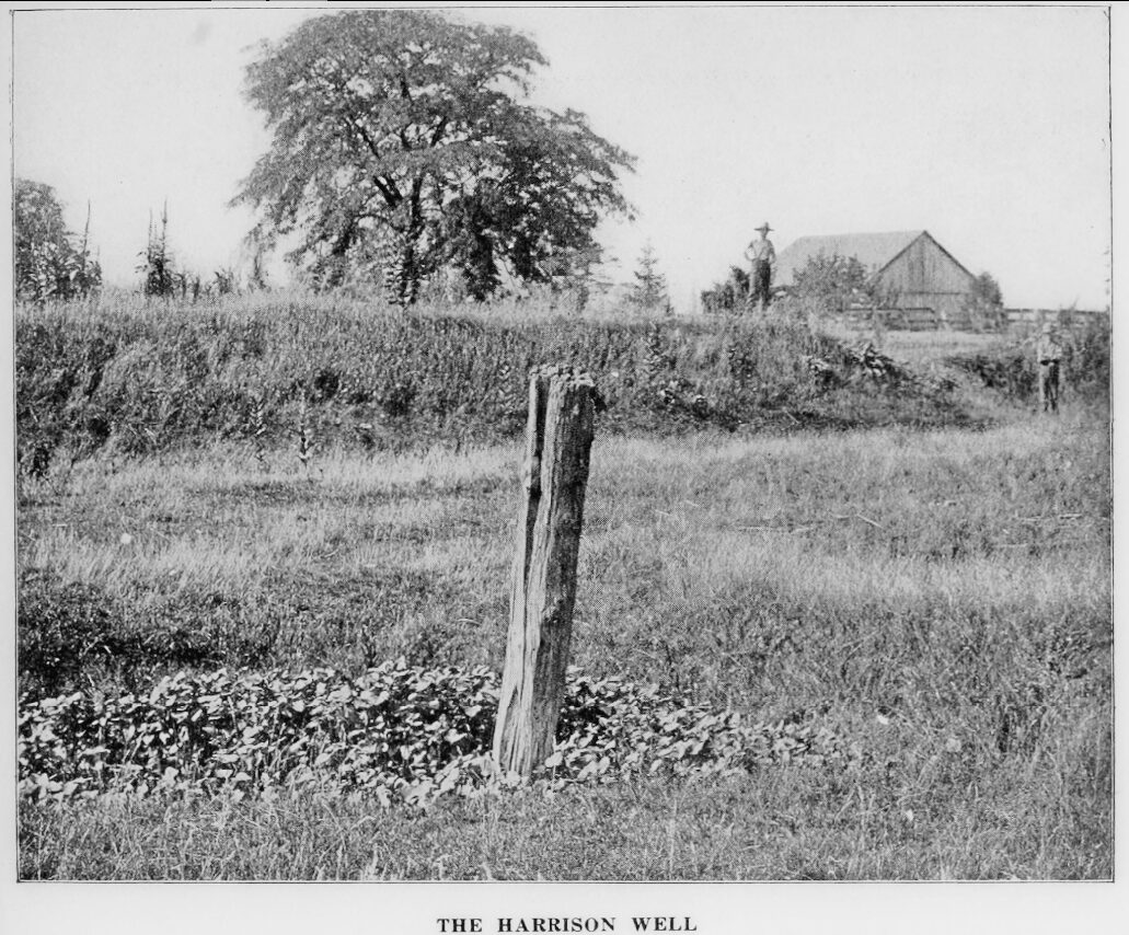 1902 photograph showing the Locofoco log sticking out of the ground, previously the well, at Fort Meigs. Image published in Gunckel's Early History of the Maumee Valley.
