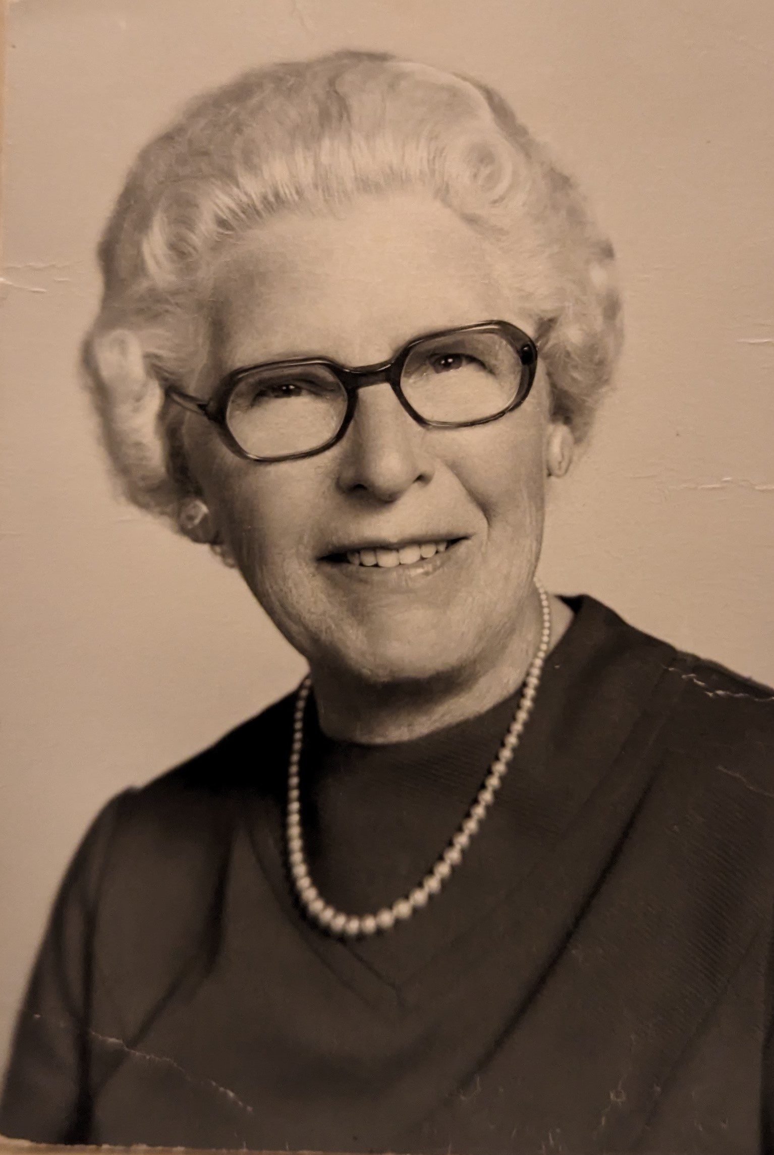 A sepia-toned photograph of a woman