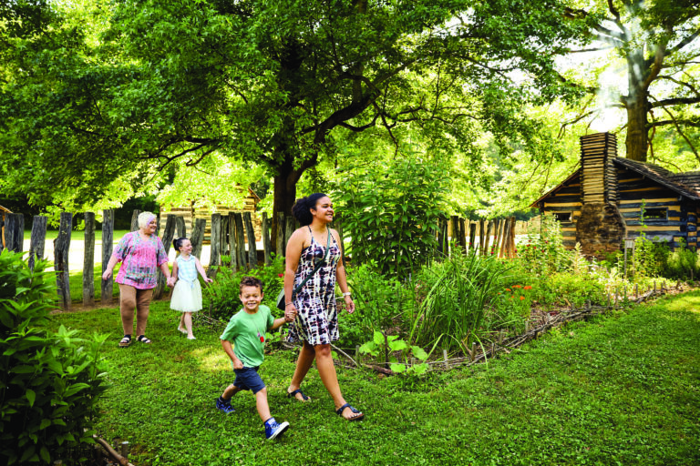 Image of visitors walking through Schoenbrunn Village.