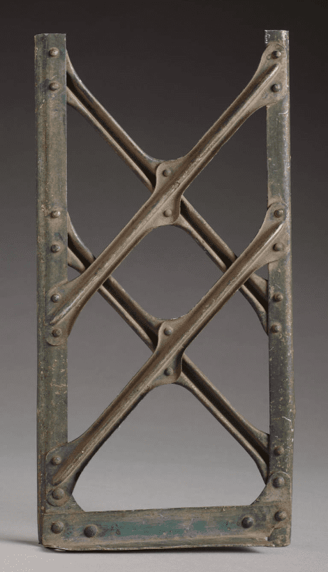 Photograph of a metal fragment from the USS Shenandoah 
