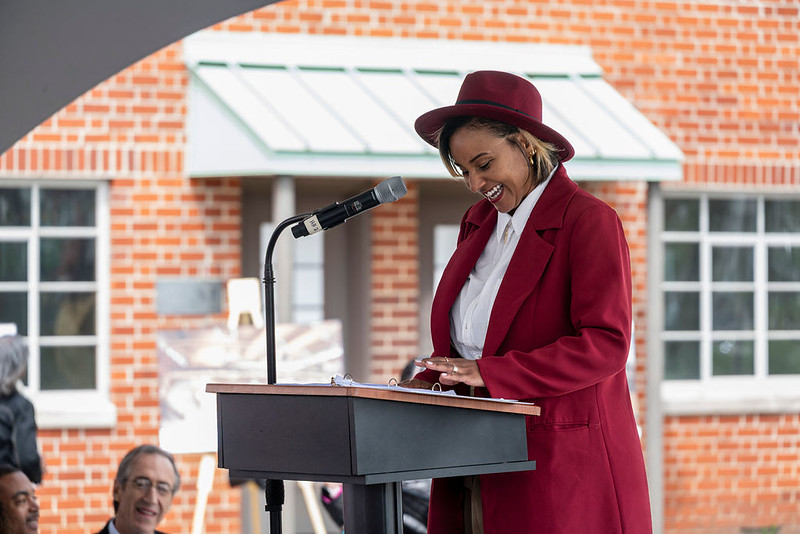 Project manager, Shelbi Toone, speaks at the groundbreaking for Poindexter Village African American Museum.