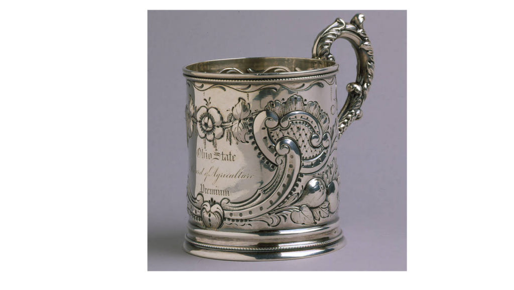 A silver cup engraved with "Ohio State Board of Agriculture Premium" was awarded at the Ohio State Fair in Cleveland in either 1852 or 1856.