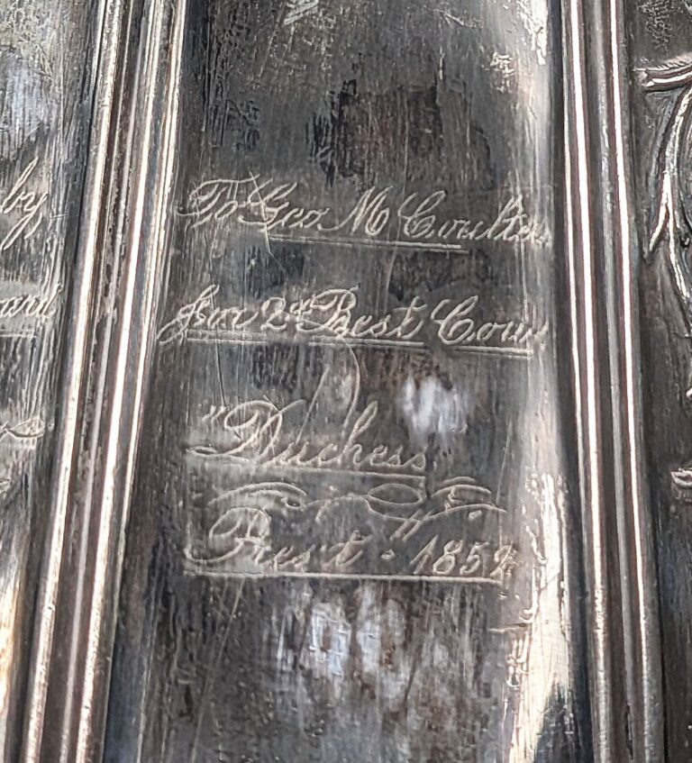 Detail of engraving on water pitcher, reads "To Geo M. Coulter for 2nd Best Cow “Duchess. Prest – 1859."
