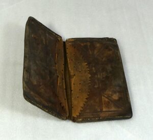 Photograph of a ca. 1780 pocketbook.