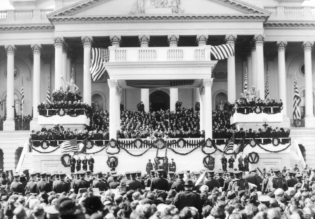 Chief Justice Edward White gives the Oath of Office to Warren Harding on March 4, 1921 on the East Front of the U.S. Capitol Building.