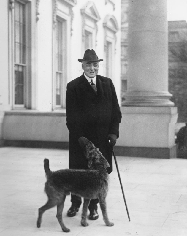 President Harding on a walk with his dog, Laddie Boy, in 1923.