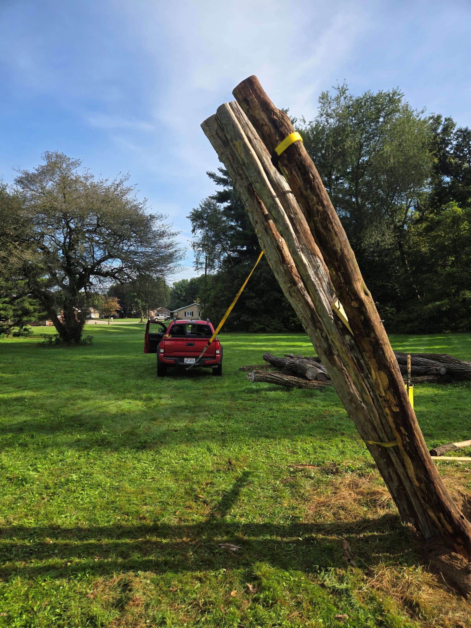During the Fort Laurens for reconstruction in 2026, archaeologists use a car to raise a timber into place.