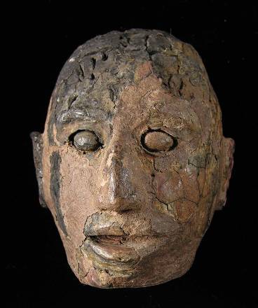 Ceramic sculpture of a human face excavated from the Seip Mound. (A 957/123)